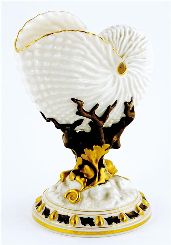 Appraisal: Royal Worcester nautilus-form porcelain vase circa upturned molded shell supported