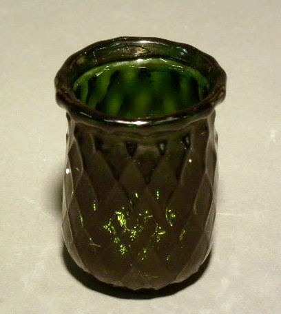 Appraisal: Dark emerald green glass Christmas light th c h x