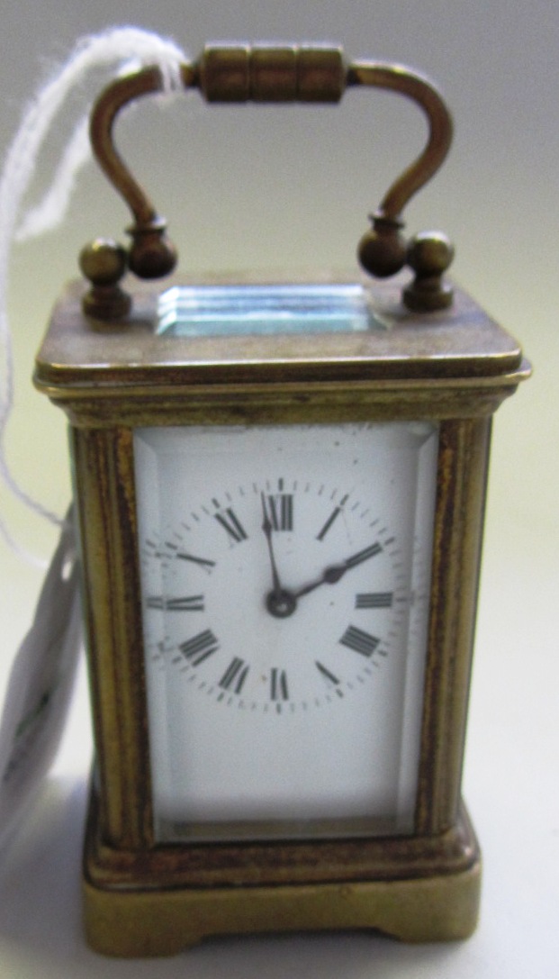 Appraisal: A miniature brass cased carriage clock early th century with