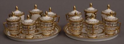 Appraisal: PAIR OF PARIS PORCELAIN TRAYS AND TWELVE POTS DE CREME