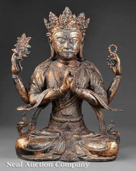 Appraisal: A Sino-Tibetan Gilt Bronze Figure of a Four-Armed Bodhisattva modeled