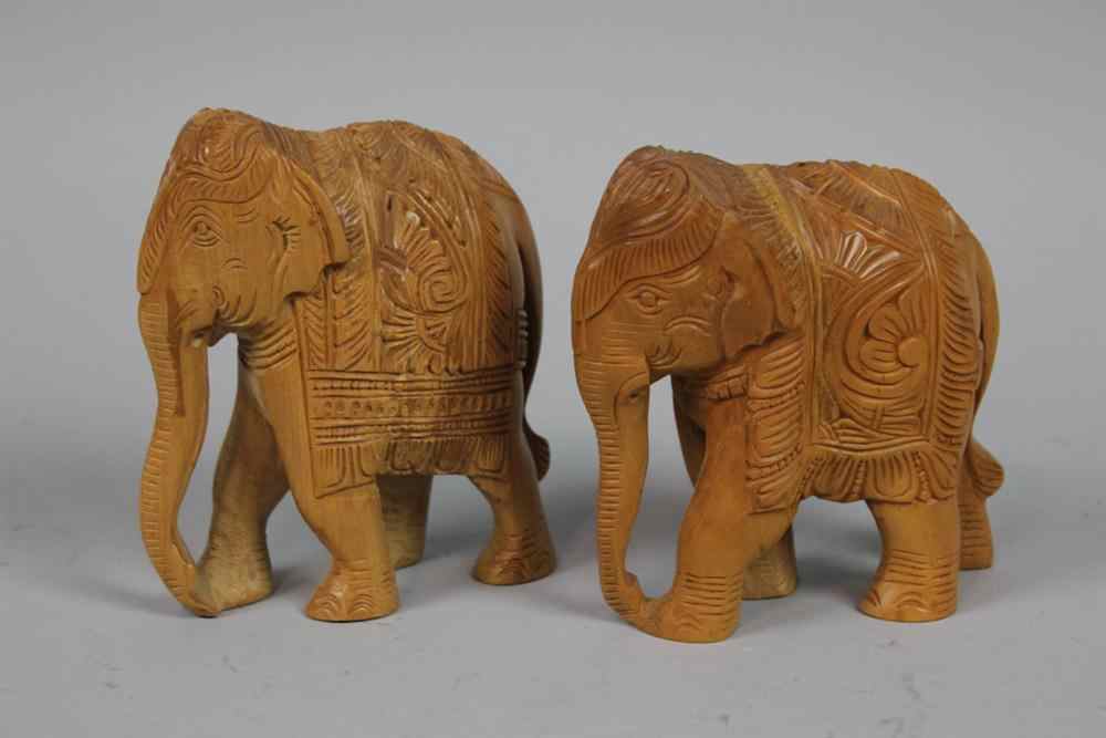 Appraisal: TWO CARVED WOOD ELEPHANTS h in