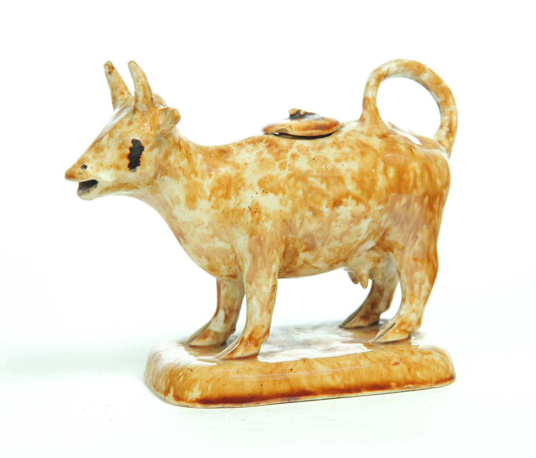 Appraisal: ROCKINGHAM COW CREAMER American nd quarter- th century Freestanding cow