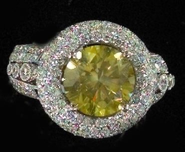 Appraisal: Fourteen-Karat White Gold and Yellow and White Diamond Lady's Ring