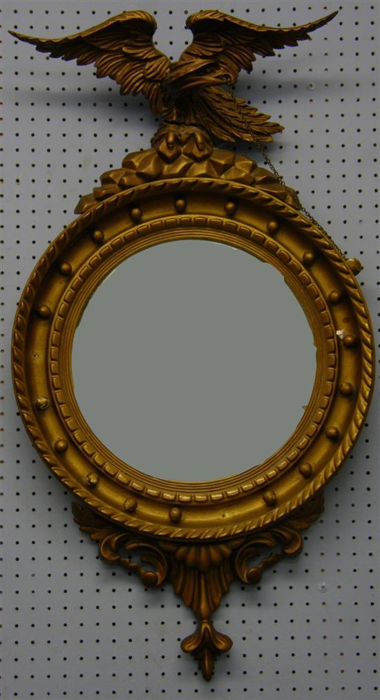 Appraisal: Gilt framed convex wall mirror with eagle finial in early