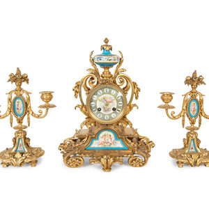 Appraisal: A French Gilt Bronze and S vres Porcelain Clock Garniture