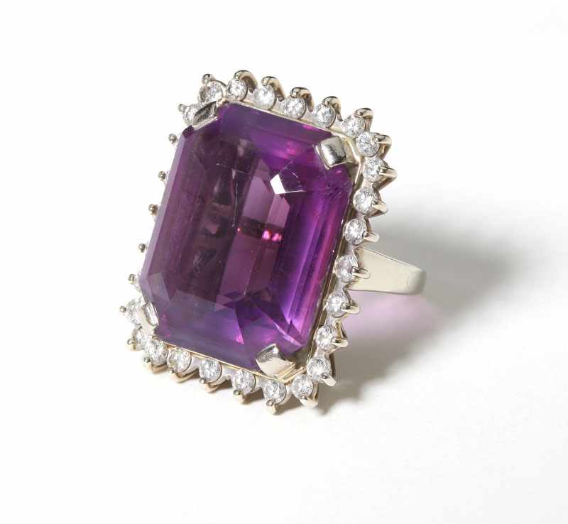 Appraisal: K white gold centering a rectangular-cut amethyst weighing approximately cts