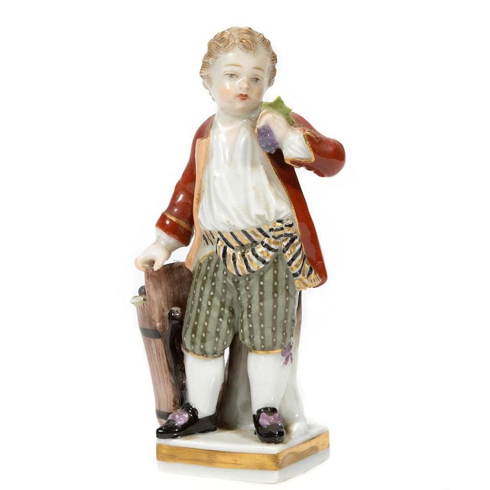 Appraisal: Meissen Figure Depicting a youth with basket of grapes in