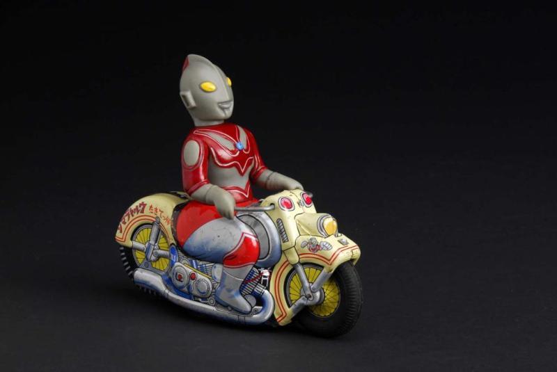 Appraisal: Ultra Man on Motorcycle Toy Description Japanese Made by Bullmark