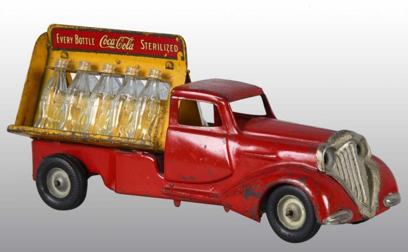 Appraisal: Pressed Steel Metalcraft Coca-Cola Truck Toy Description American Includes ten