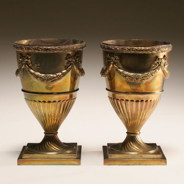 Appraisal: Pair classical style solid brass urns wreath border around rim