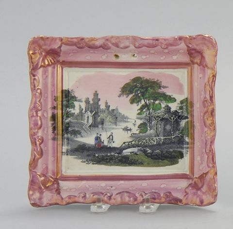 Appraisal: SUNDERLAND POLYCHROME LUSTRE PLAQUE Circa With river landscape with castle