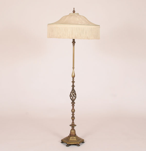 Appraisal: Brass floor lamp turned and hand wrought base two light