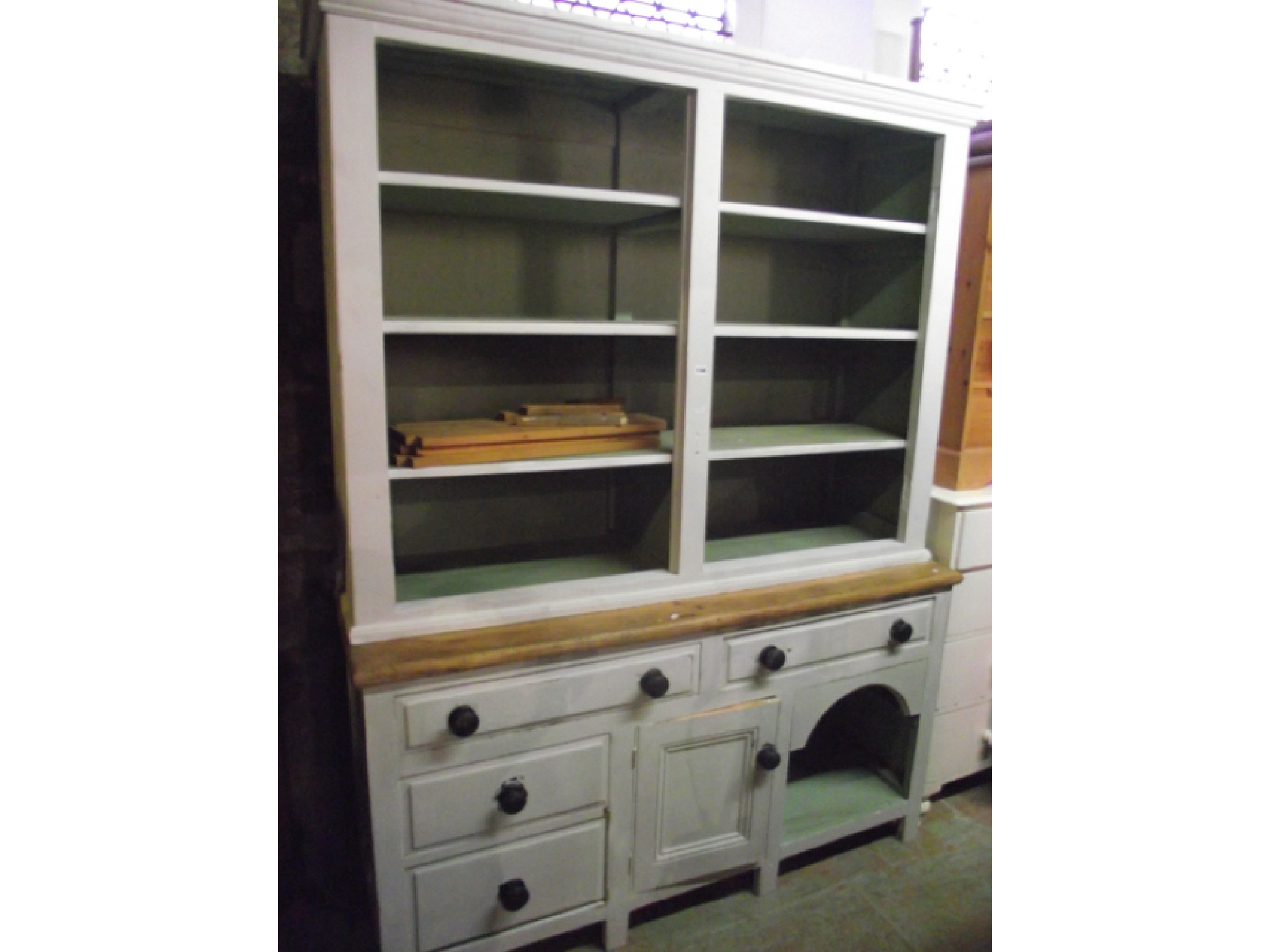 Appraisal: A th century pine dresser the base fitted with dog