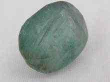 Appraisal: A loose polished emerald approx carats x x mm deep