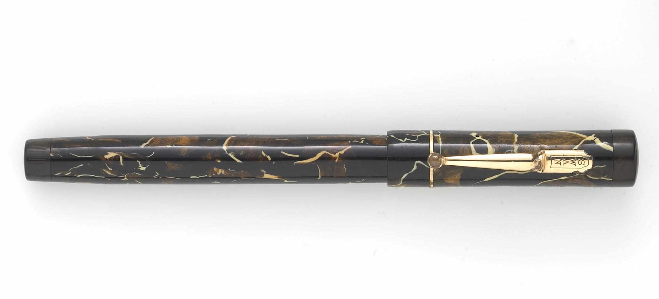 Appraisal: SWAN Fountain Pen in black and gold marble with white