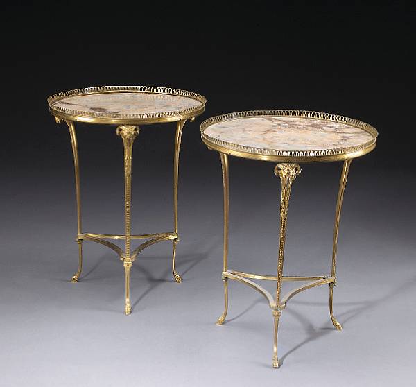 Appraisal: A pair of Neoclassical style gilt bronze and marble gueridons