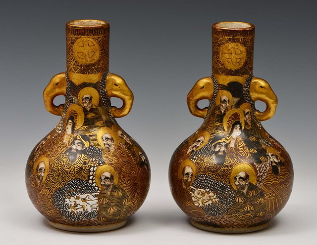 Appraisal: A PAIR OF SATSUMA SMALL BOTTLE VASES each with figure