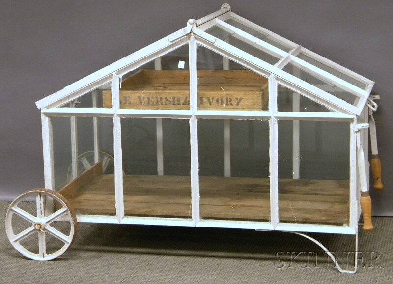 Appraisal: White-painted Glazed Iron Rolling Greenhouse overall approx ht lg wd