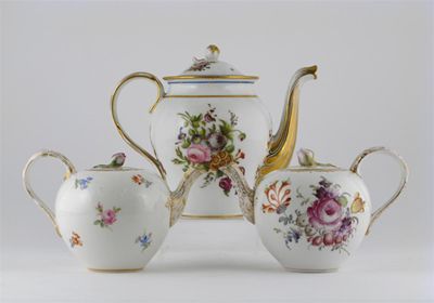 Appraisal: Two Meissen teapots and covers one painted with flowerheads the