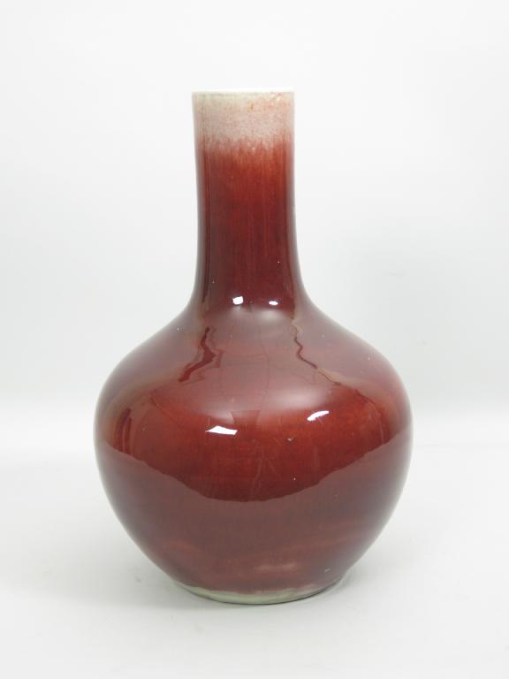 Appraisal: A Chinese club shape Vase with sang de boeuf glaze