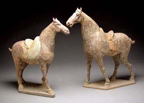 Appraisal: PAIR EARLY TANG POTTERY HORSES Pair unusually well modeled one