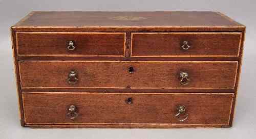 Appraisal: A George III mahogany miniature chest of drawers inlaid with