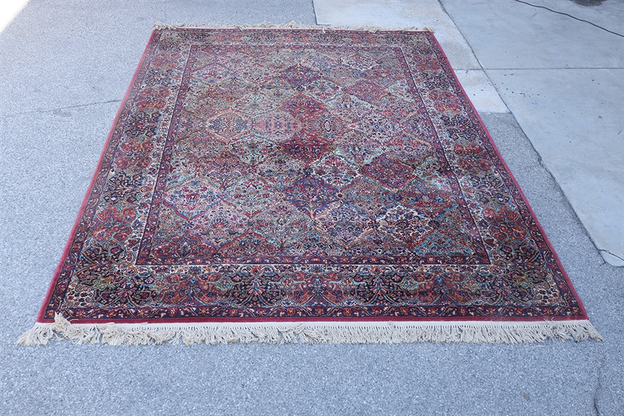 Appraisal: Persian wool rug with repeating design in various colors some