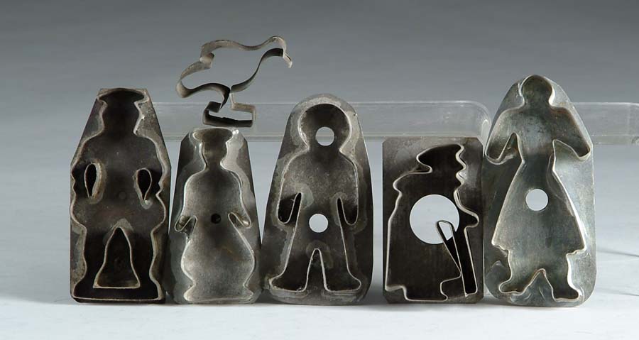 Appraisal: FIVE FIGURAL PEOPLE TIN COOKIE CUTTERS Two with handles three