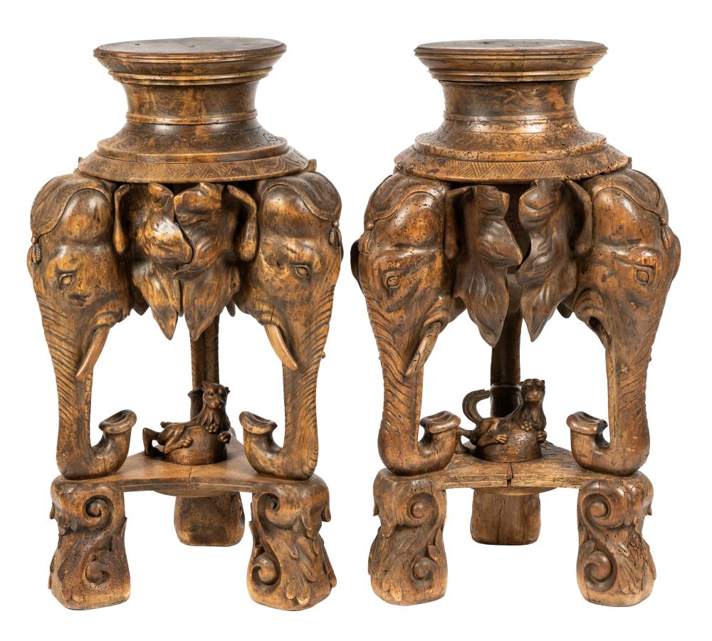 Appraisal: PAIR OF INDIAN CARVED WOOD PEDESTALSeach round platform on a