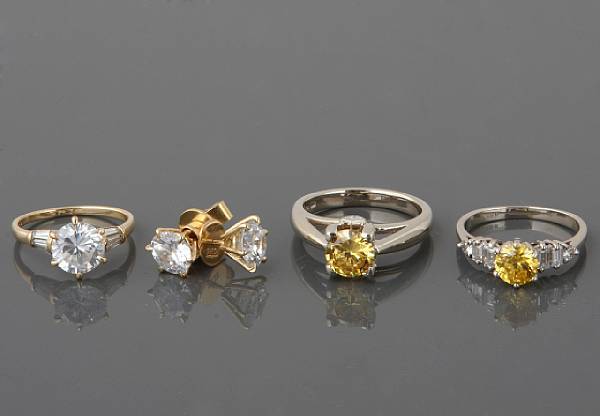 Appraisal: A collection of stone diamond and gold jewelry featuring three