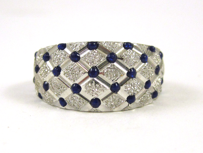 Appraisal: BLUE ENAMEL AND FOURTEEN KARAT GOLD RING The white gold