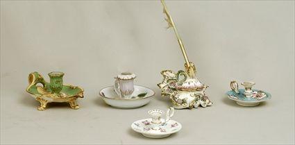 Appraisal: Four English and Continental Gilt and Polychrome Decorated Porcelain Chambersticks