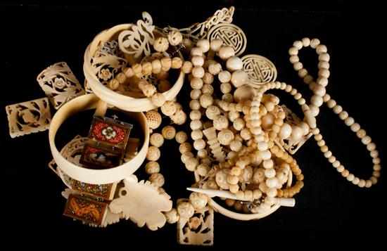 Appraisal: Group of carved bone and ivory jewelry including bracelets earrings