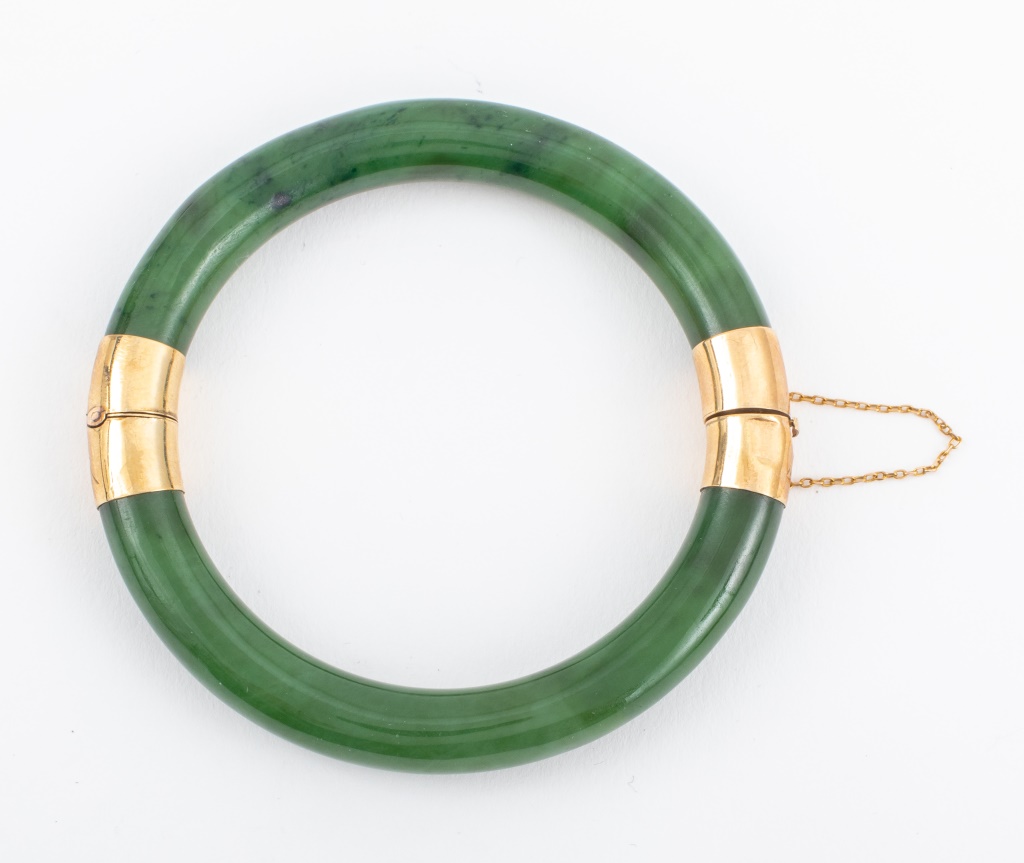 Appraisal: K YELLOW GOLD HINGED JADE BANGLE Bangle with K yellow