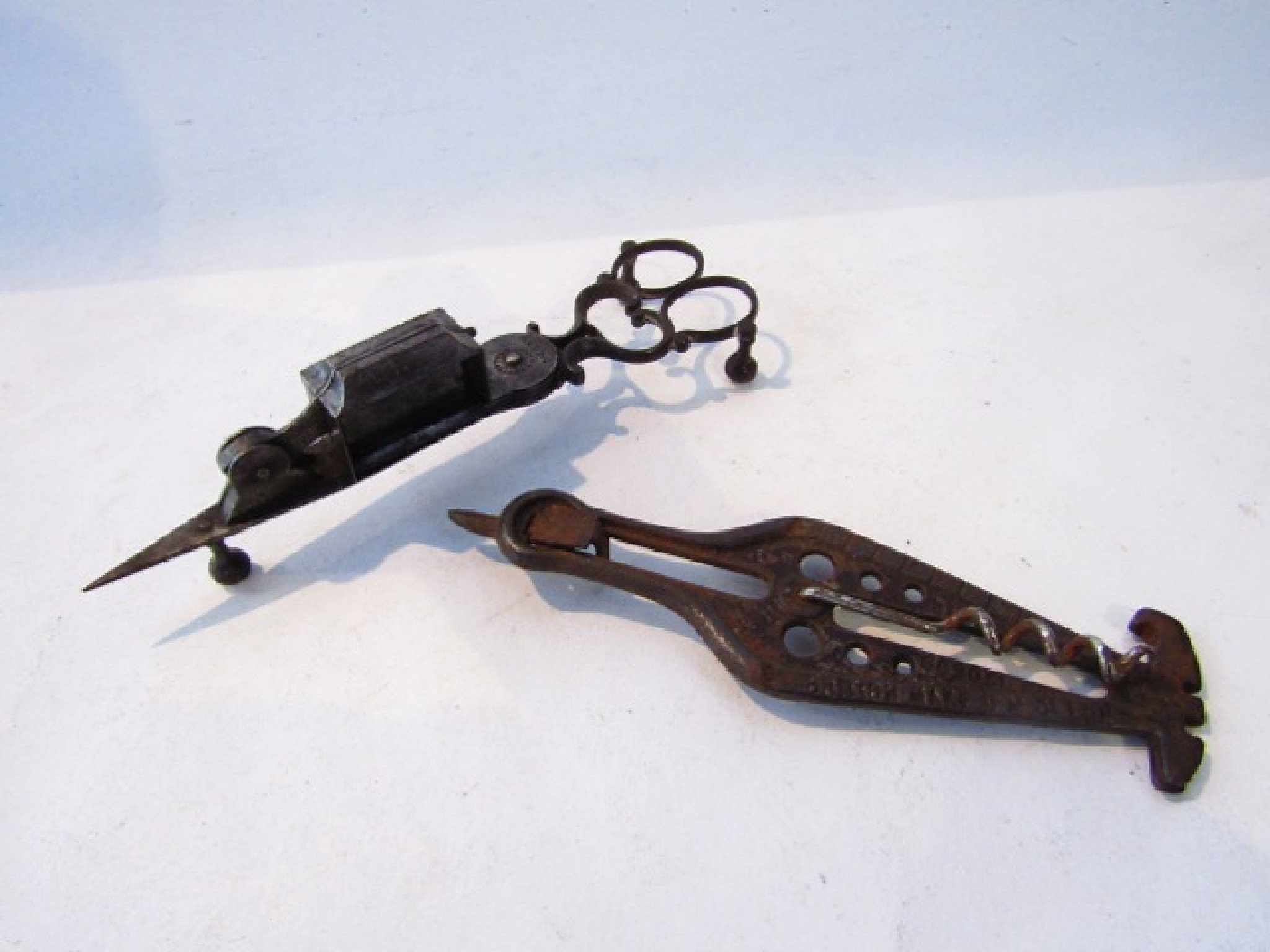 Appraisal: A Georgian steel pair of sprung wick scissors stamped patent