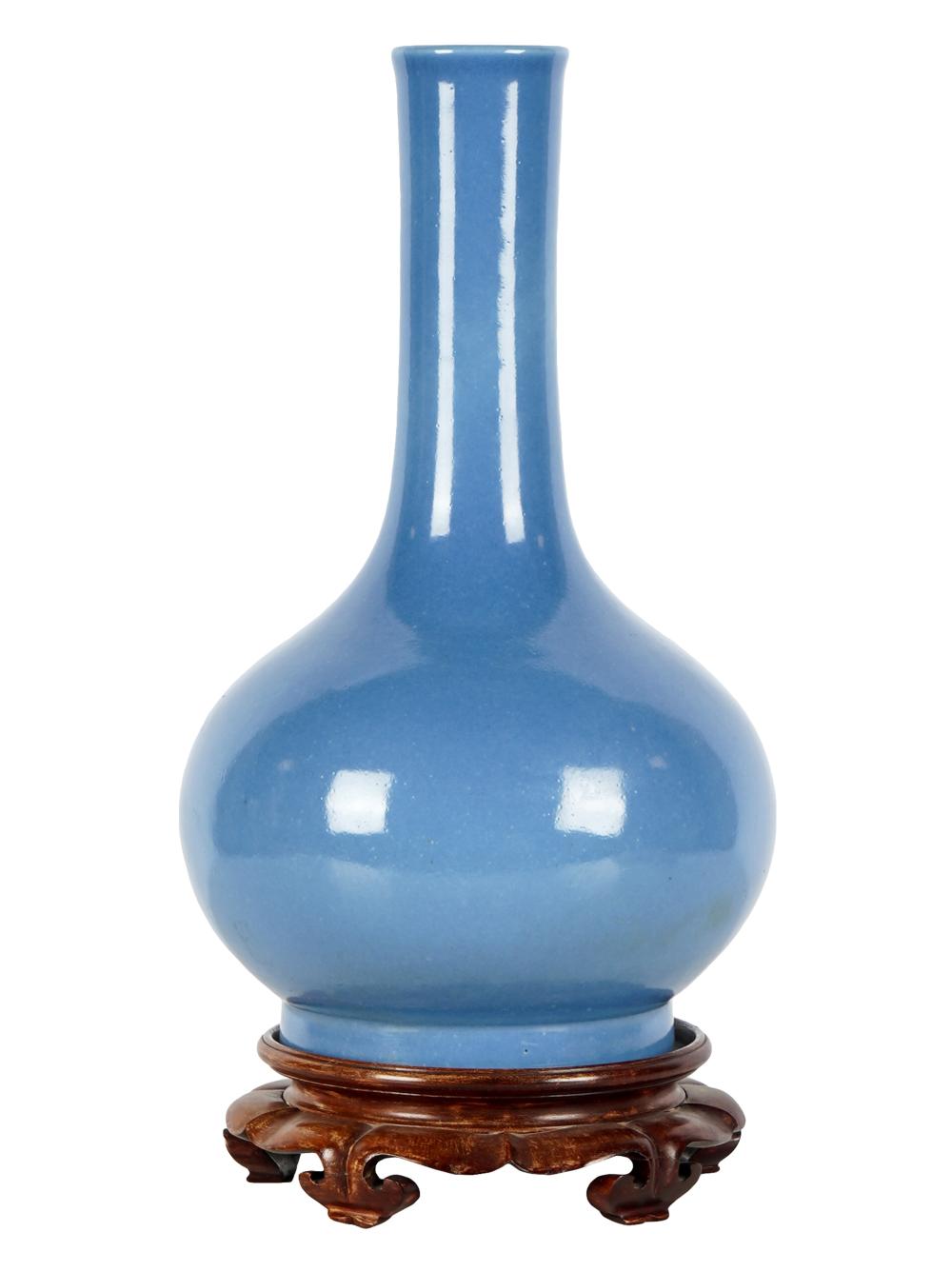 Appraisal: CHINESE MONOCHROME BLUE-GLAZED VASEunmarked with wooden stand vase inches high