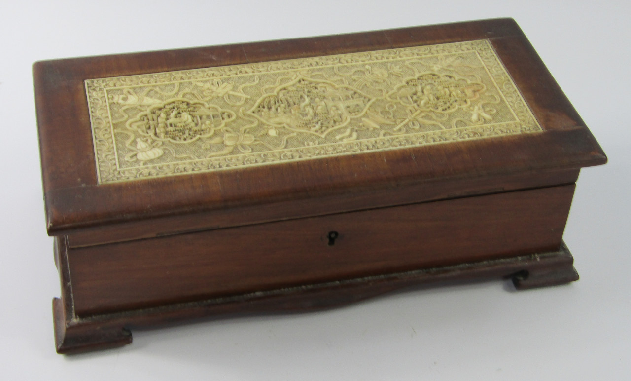 Appraisal: A mid thC ivory and hardwood jewellery casket rectangular central