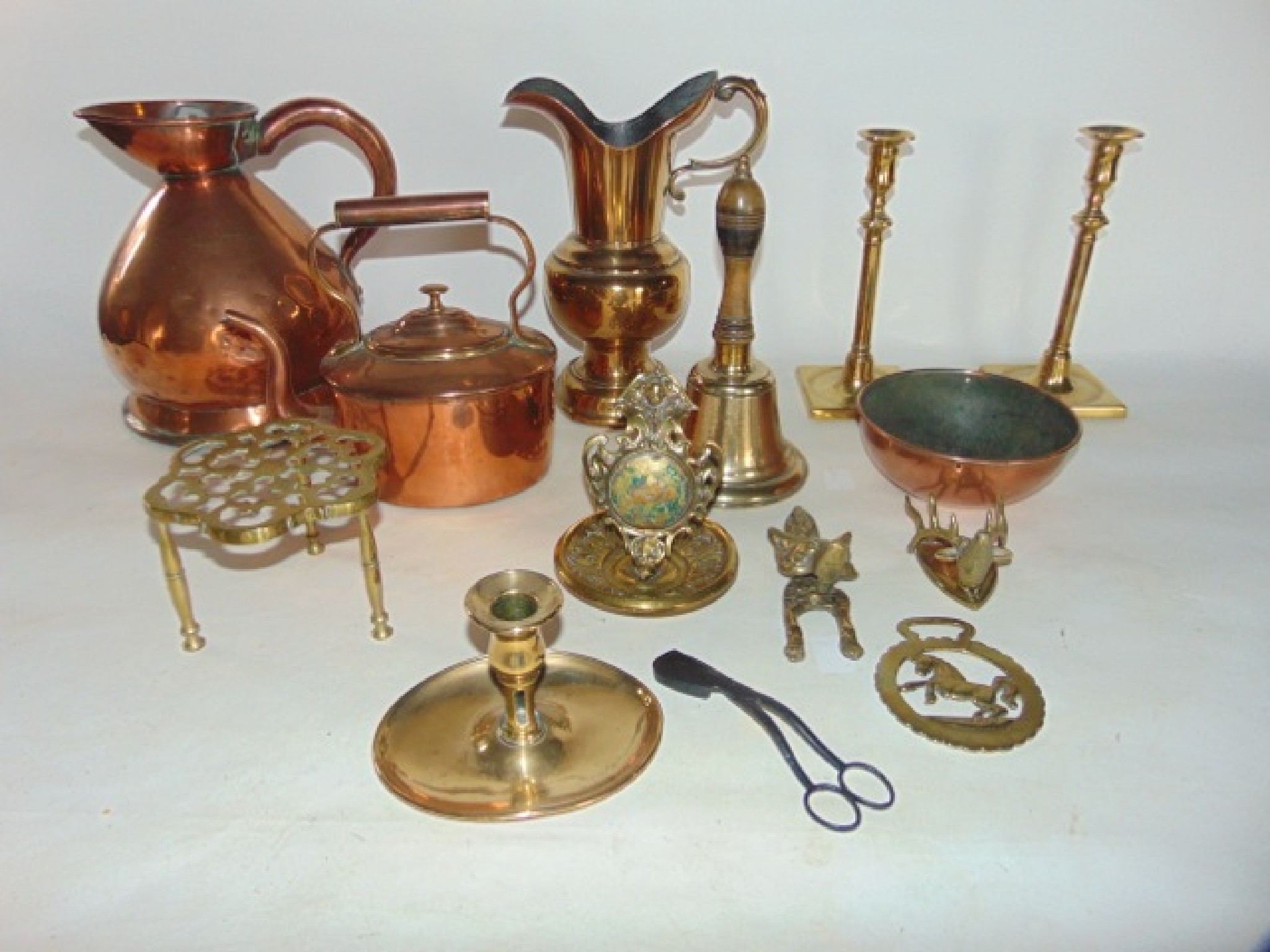 Appraisal: A collection of antique metal wares to include a copper