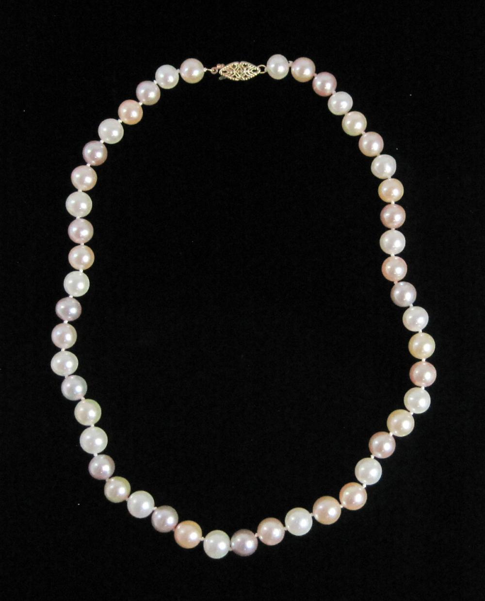 Appraisal: MULTI COLOR PEARL AND FOURTEEN KARAT GOLD NECKLACE hand-knotted strand