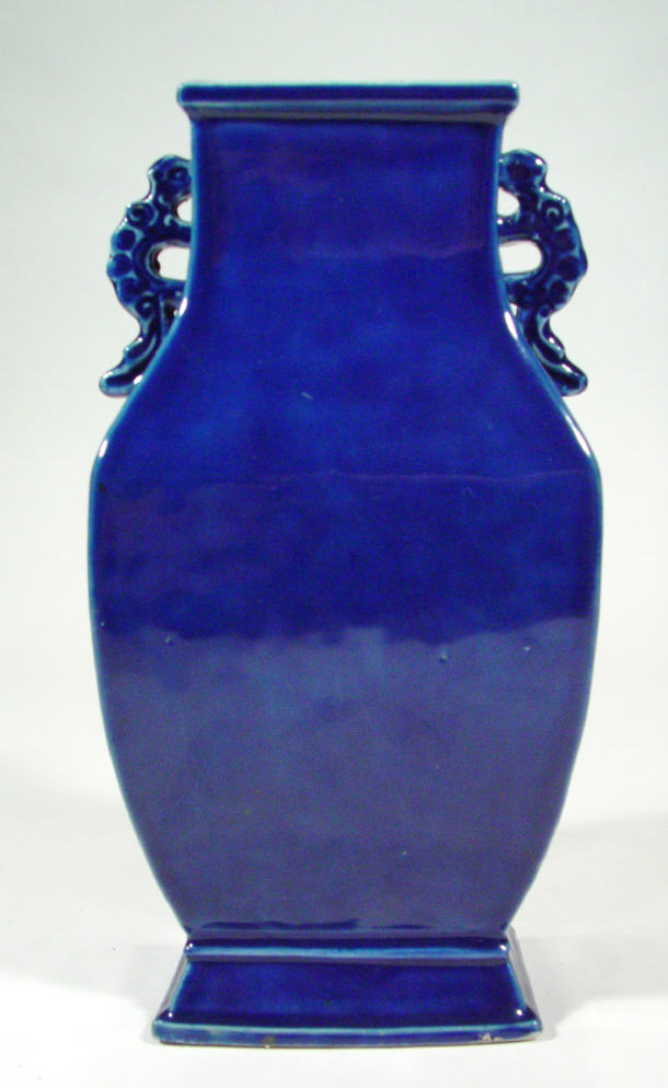 Appraisal: Oriental blue glazed stoneware vase with lizard handles cm high