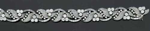 Appraisal: DIAMOND BRACELET ca Platinum Fancy bracelet with stylized leaf motifs