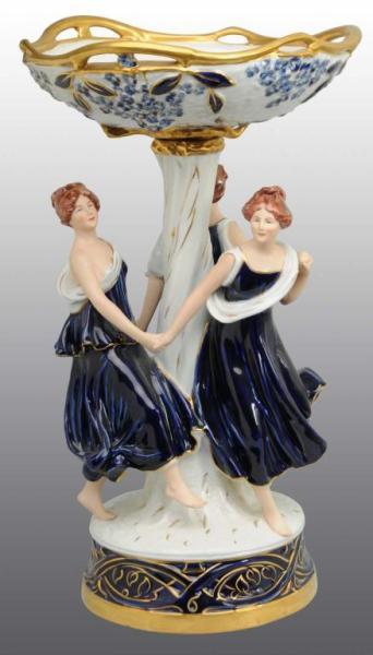 Appraisal: Porcelain Royal Dux Statue with Dancing Ladies Description No damage