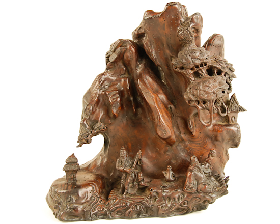 Appraisal: An Early Chinese Wood Carving of a Mountain Landscape possibly