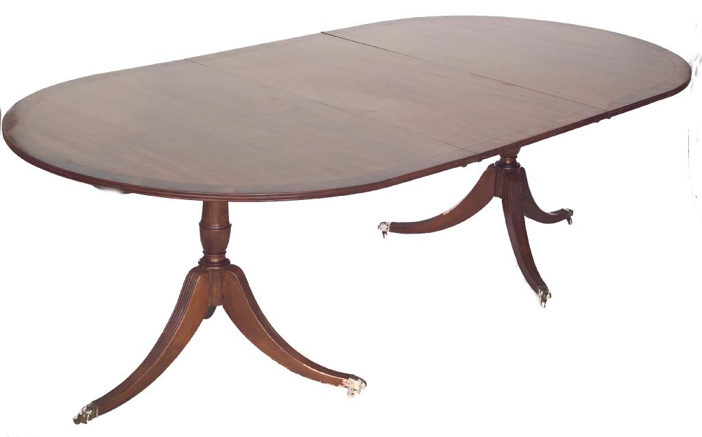 Appraisal: EDWARDIAN TWIN-PEDESTAL MAHOGANY DINING TABLE IN REGENCY STYLE the cross-banded