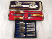 Appraisal: A three piece staghorn handled carving set in fitted case