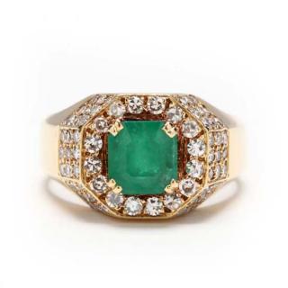 Appraisal: KT Emerald and Diamond Ring centering on one emerald cut