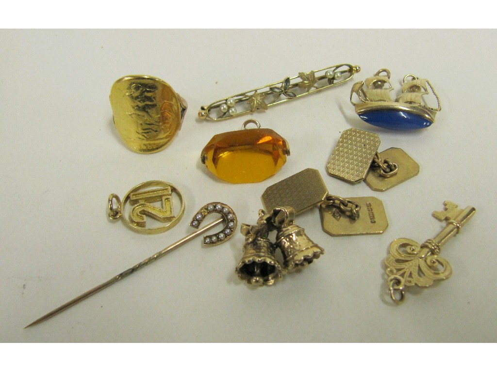 Appraisal: Lot comprising sovereign dress ring worn four ct gold charms