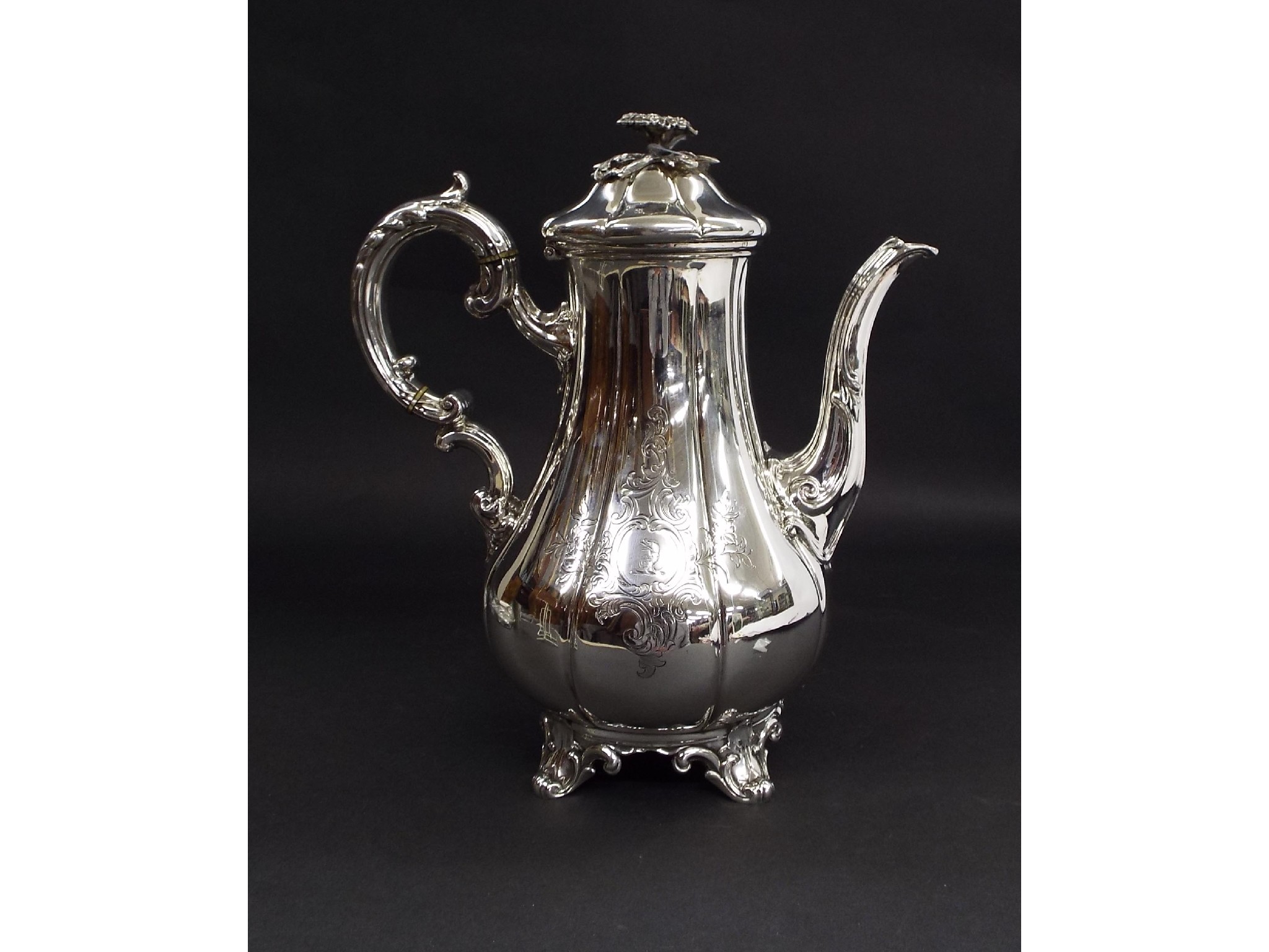 Appraisal: Victorian silver faceted baluster coffee pot with double 'C' scroll