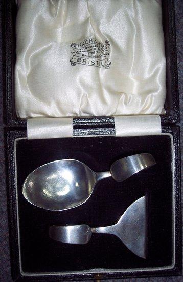 Appraisal: A cased spoon and pusher the spoon L S Birmingham